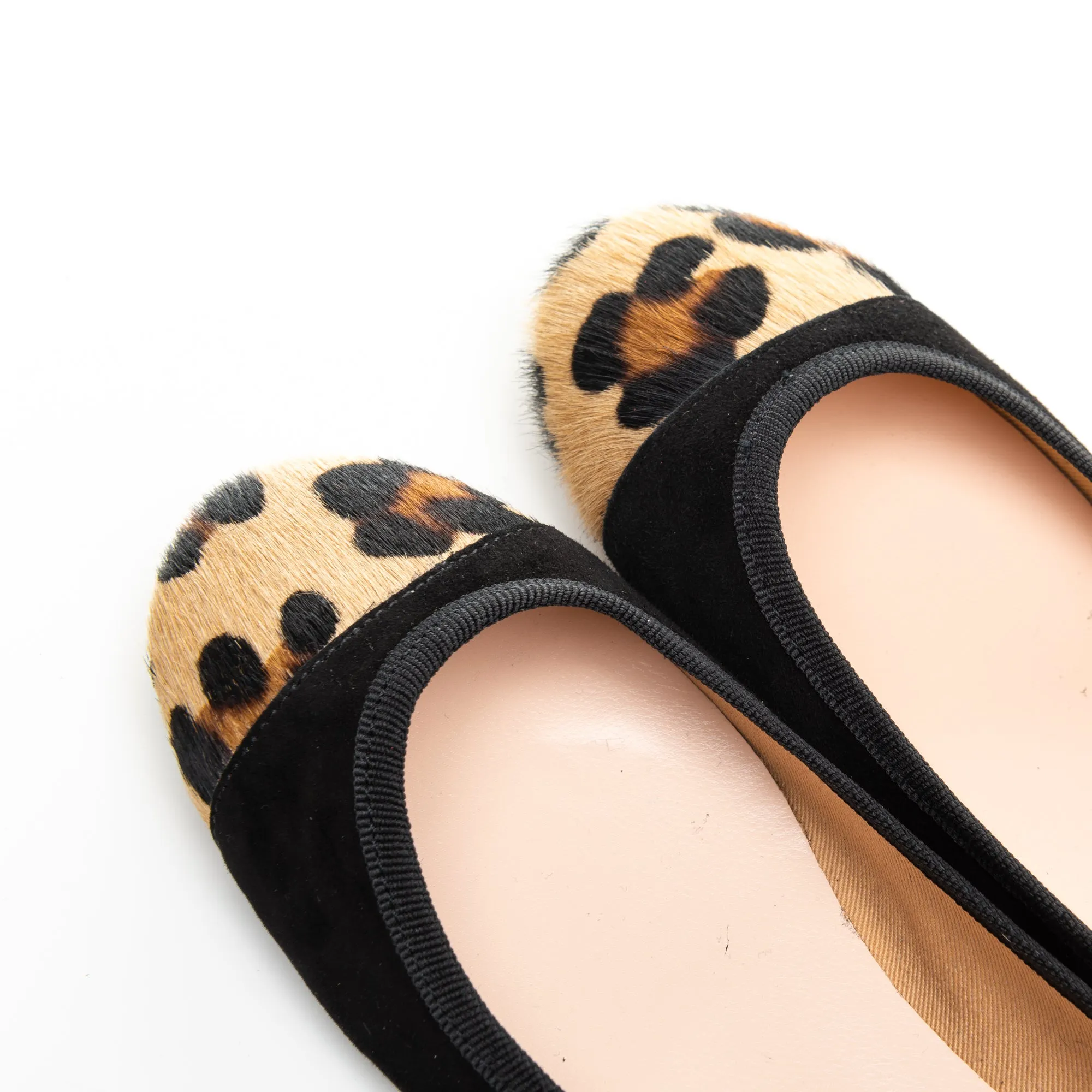 Black suede ballet flats with leopard spotted toe