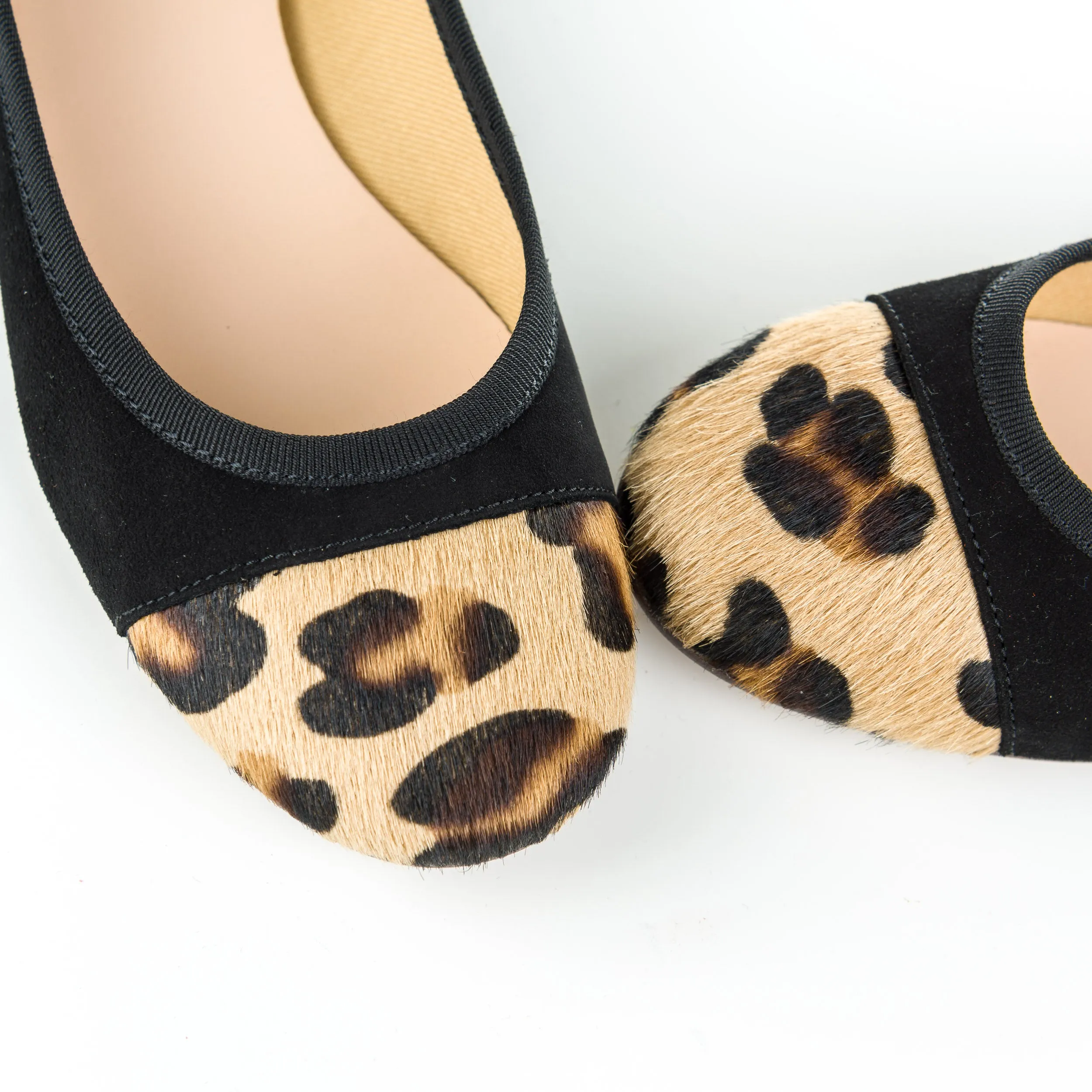 Black suede ballet flats with leopard spotted toe